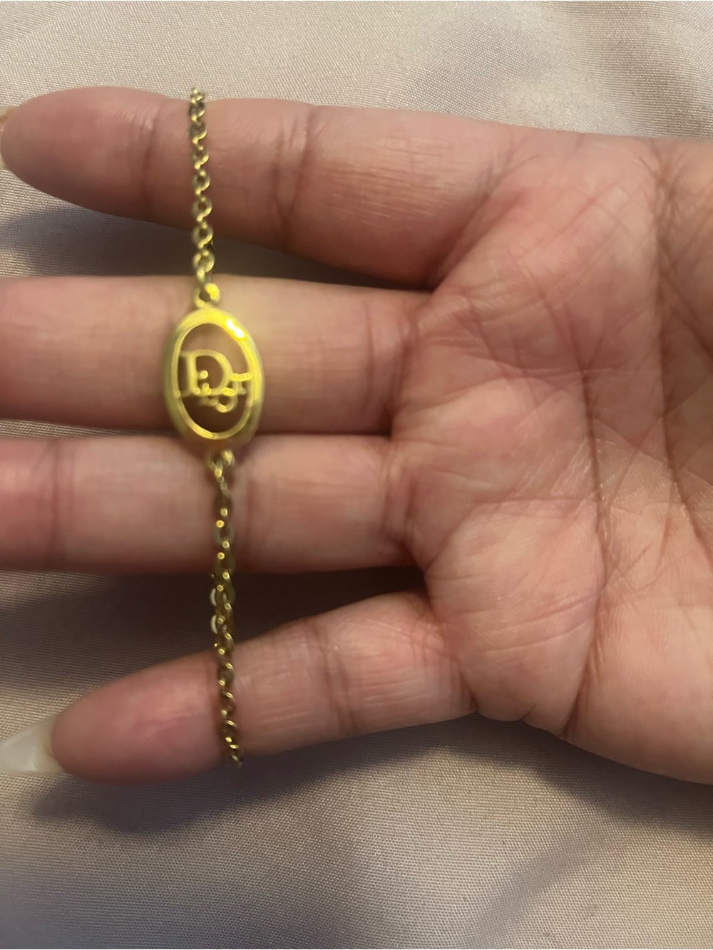 Dior Gold Tone Oval Monogram Bracelet